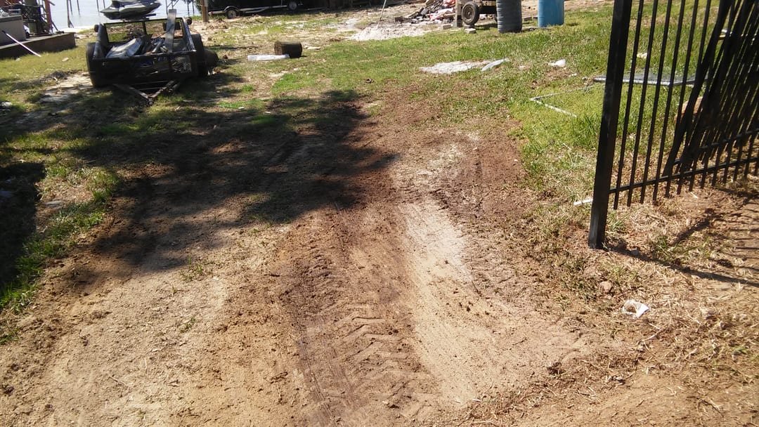 Galvanized chain link fence around a mobile home yard