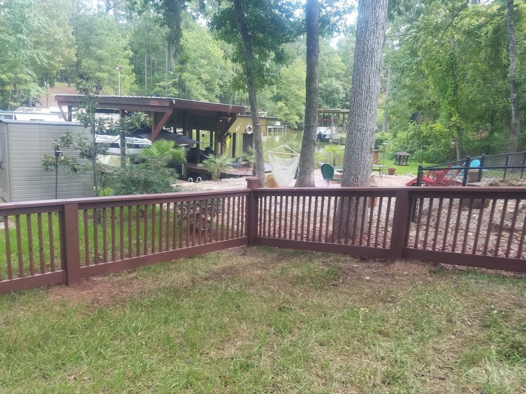 Deck with handrail and steps down to the yard