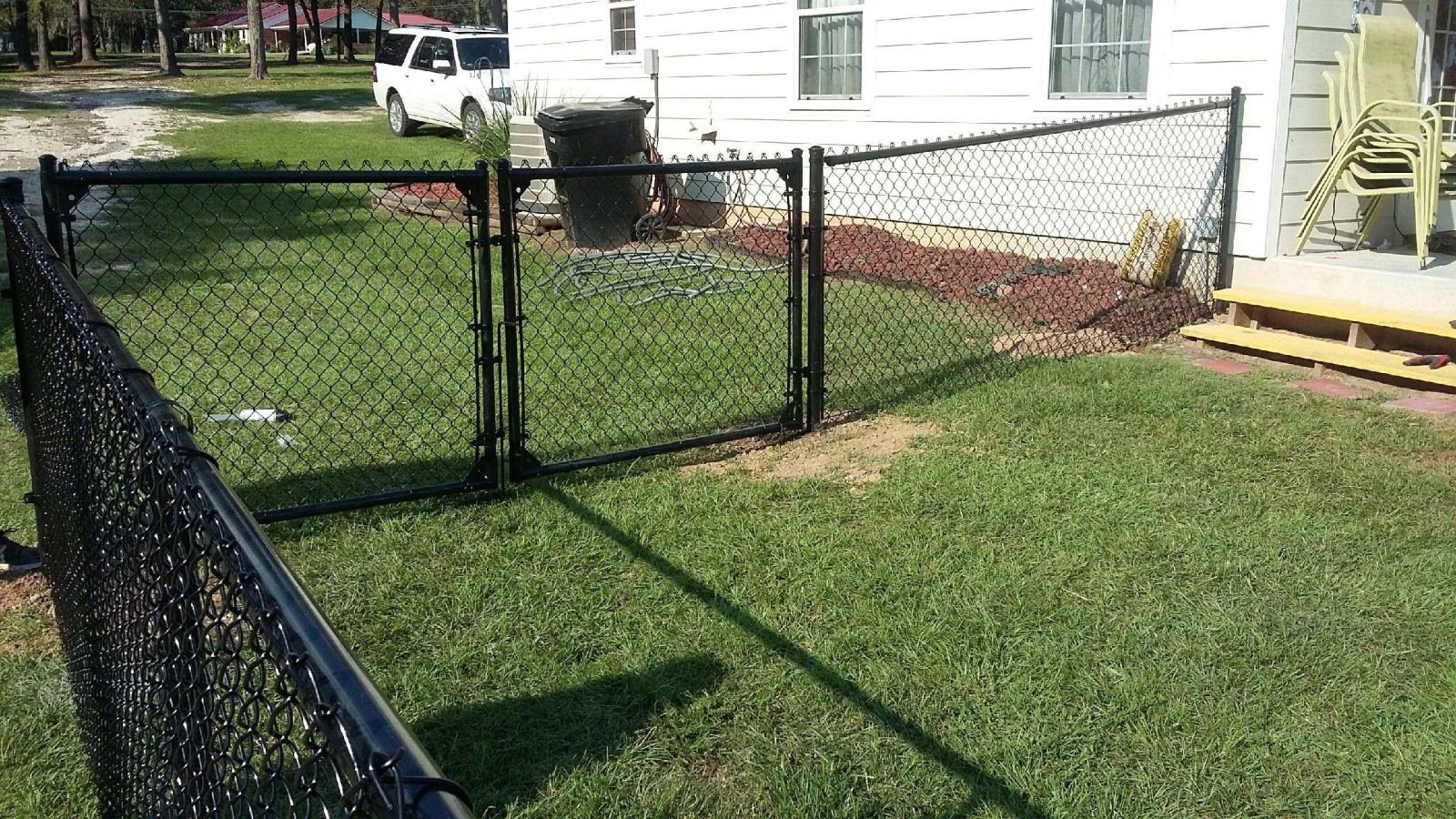 Chain-link walk gate at a residential property