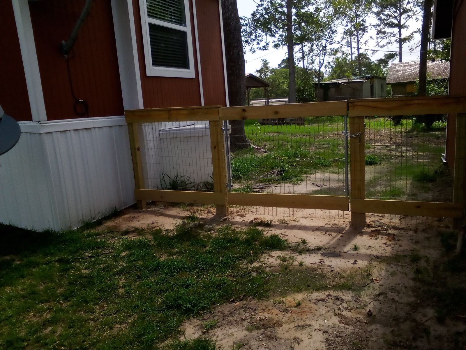 Tube gate on a field fence property line