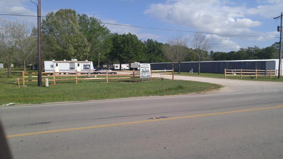 Cedar split rail fence at an RV park entrance