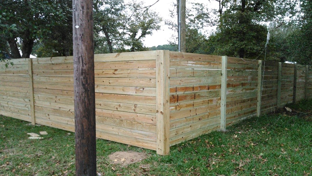 Horizontal cedar fence on a residential lot