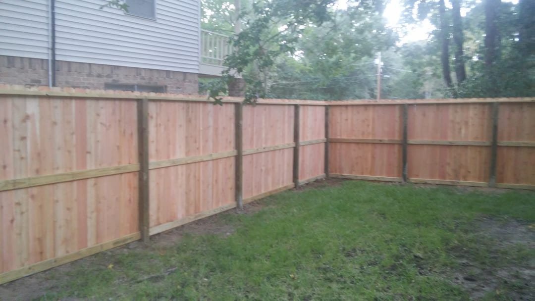 Cedar privacy fence along a residential property